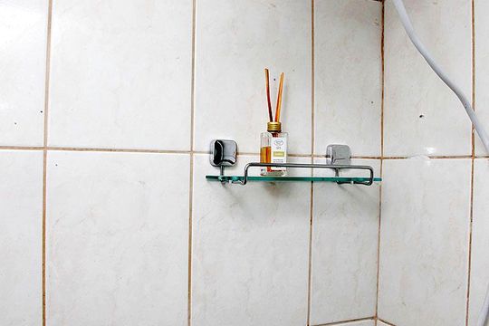 Banheiro de apartamento à venda com 1 quarto, 26m² em Menino Deus, Porto Alegre