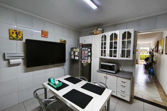 Cozinha de casa de condomínio à venda com 3 quartos, 100m² em Parada Inglesa, São Paulo