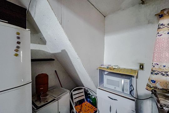 Cozinha de casa para alugar com 1 quarto, 50m² em Vila Carrão, São Paulo