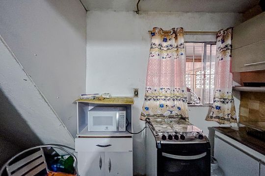 Cozinha de casa para alugar com 1 quarto, 50m² em Vila Carrão, São Paulo