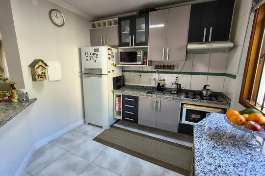 Cozinha de casa à venda com 3 quartos, 115m² em Niterói, Canoas