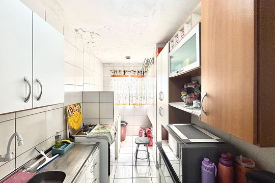 Cozinha de apartamento à venda com 2 quartos, 57m² em Jardim Artur Alvim, São Paulo