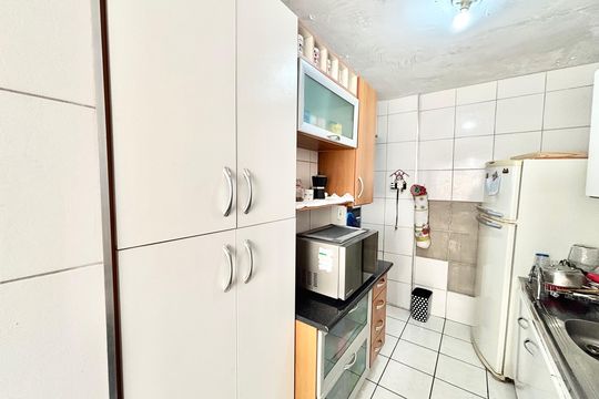 Cozinha de apartamento à venda com 2 quartos, 57m² em Jardim Artur Alvim, São Paulo