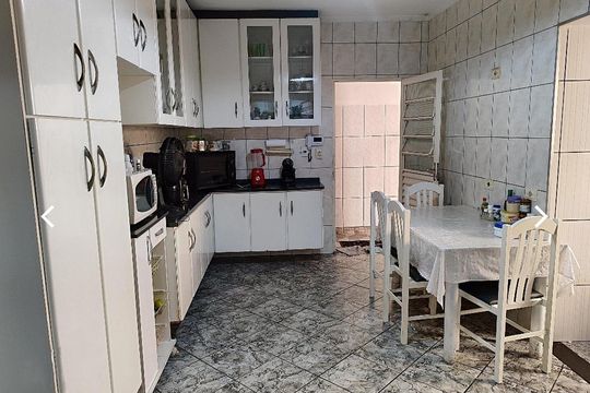 Cozinha de casa à venda com 4 quartos, 180m² em Vila Continental, São Paulo