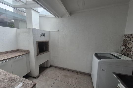 Área de serviço de casa de condomínio à venda com 3 quartos, 98m² em Cavalhada, Porto Alegre