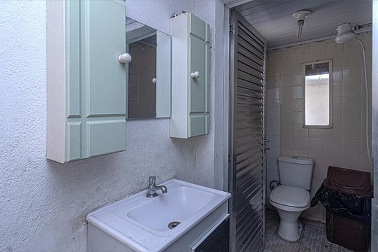banheiro na área de serviço_1 de casa à venda com 3 quartos, 210m² em Cursino, São Paulo