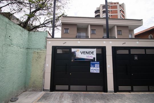 Fachada de casa à venda com 3 quartos, 130m² em Vila Ester (zona Norte), São Paulo