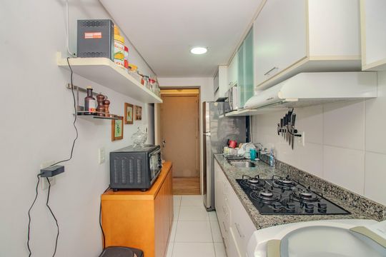 Cozinha e Área de Serviço de apartamento para alugar com 2 quartos, 49m² em Rubem Berta, Porto Alegre