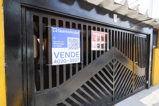 Fachada de casa à venda com 3 quartos, 110m² em Santo Antônio, Osasco