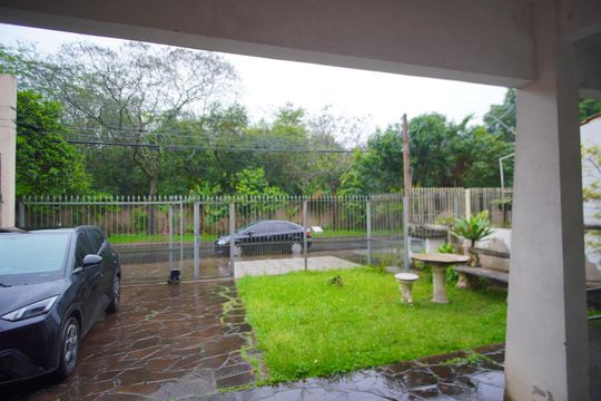 Sala 1 - Vista de casa à venda com 3 quartos, 120m² em Rubem Berta, Porto Alegre