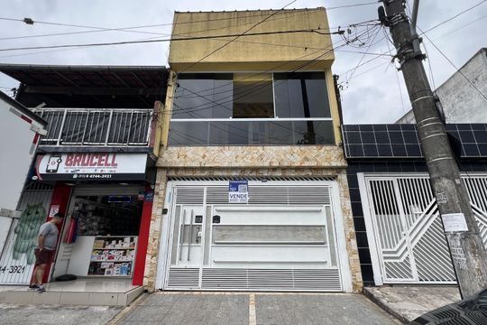 Fachada com placa grande de casa à venda com 4 quartos, 125m² em Vila Paraiso, Guarulhos