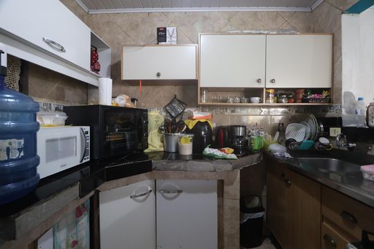 Cozinha - Armários de casa à venda com 3 quartos, 70m² em Niterói, Canoas