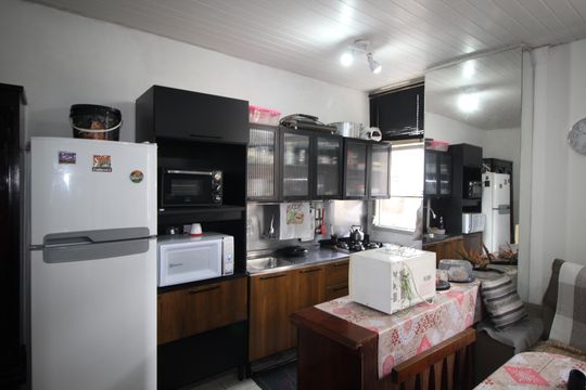 Cozinha de apartamento à venda com 1 quarto, 52m² em Floresta, Porto Alegre