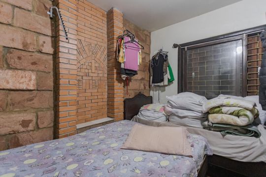 Quarto 1 de apartamento para alugar com 2 quartos, 100m² em Jardim do Salso, Porto Alegre