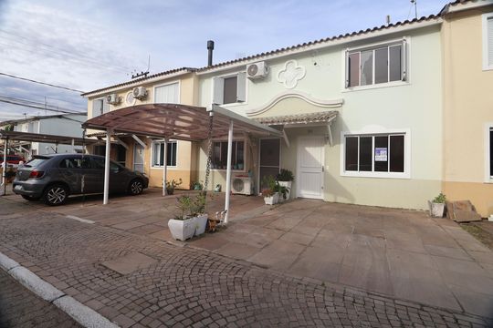 Placa de casa de condomínio para alugar com 3 quartos, 88m² em Rio Branco, Canoas