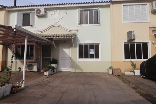 Fachada de casa de condomínio para alugar com 3 quartos, 88m² em Rio Branco, Canoas