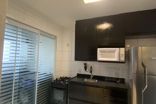 Cozinha de apartamento à venda com 2 quartos, 74m² em Jardim Tupanci, Barueri