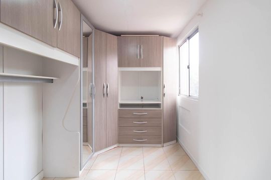 Quarto de apartamento à venda com 1 quarto, 36m² em Vila Nova, Porto Alegre