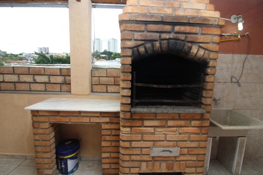 varanda com área de serviço e churrasqueira de casa para alugar com 1 quarto, 70m² em Vila Londrina, São Paulo