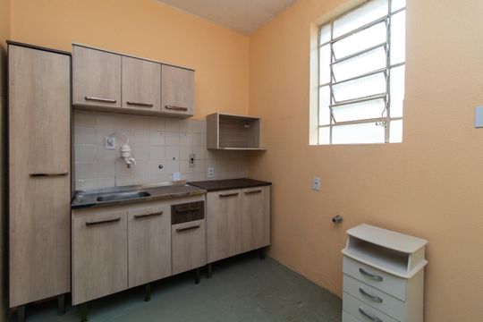 Cozinha e Área de Serviço de apartamento à venda com 2 quartos, 64m² em Centro Histórico, Porto Alegre