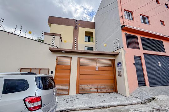 Fachada com Placa de casa de condomínio à venda com 2 quartos, 86m² em Vila Euthalia, São Paulo