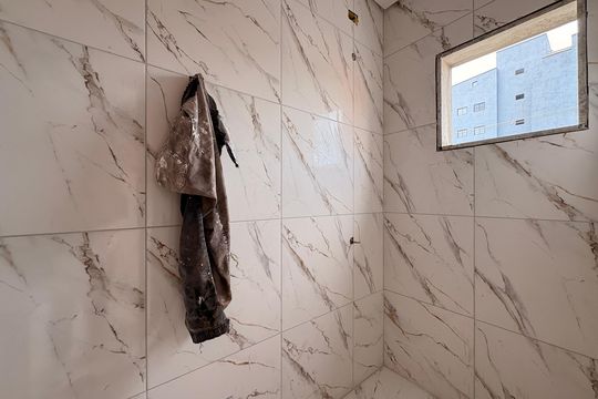 Banheiro da suíte 1 de casa à venda com 2 quartos, 72m² em Vila Lucinda, Santo André