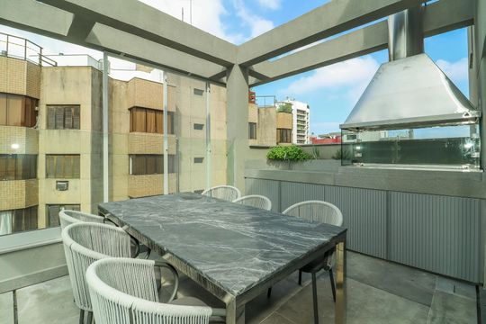 Área comum - Churrasqueira de kitnet/studio para alugar com 1 quarto, 29m² em Auxiliadora, Porto Alegre