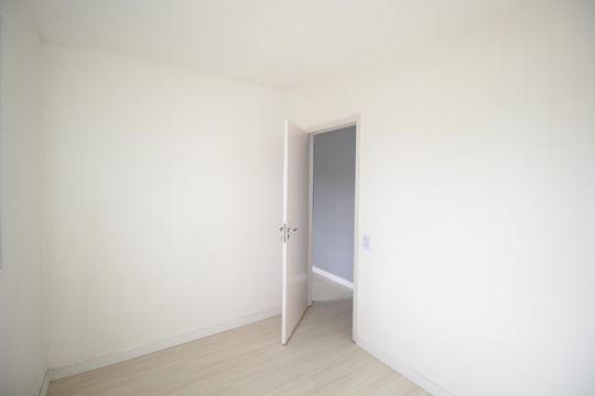 Quarto 1 de apartamento para alugar com 2 quartos, 42m² em Sarandi, Porto Alegre