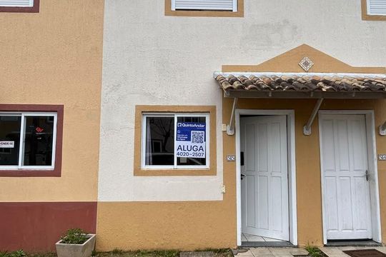 Placa  de casa de condomínio para alugar com 2 quartos, 55m² em Santa Cruz, Gravataí