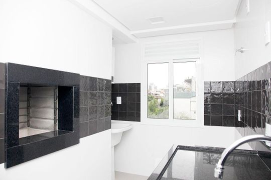 Cozinha + Área de Serviço de apartamento para alugar com 2 quartos, 63m² em Auxiliadora, Porto Alegre
