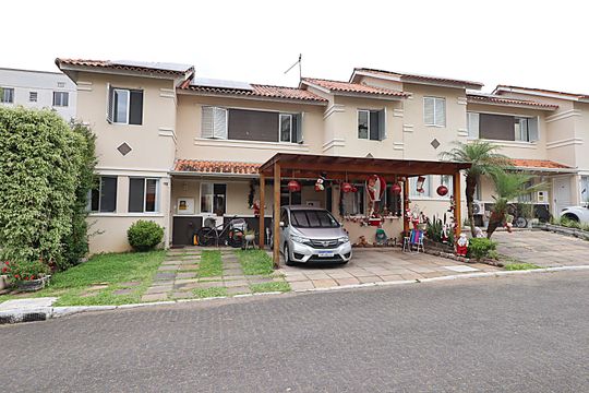 Fachada da casa de casa de condomínio à venda com 2 quartos, 96m² em Parque Santa Fé, Porto Alegre