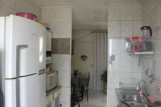 Cozinha e lavanderia  de apartamento à venda com 2 quartos, 48m² em Vila Sao Gabriel, Guarulhos