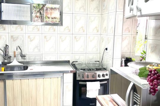 Cozinha de apartamento à venda com 2 quartos, 53m² em Conjunto Residencial José Bonifácio, São Paulo