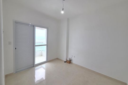 Suíte 1 de apartamento para alugar com 2 quartos, 82m² em Maracanã, Praia Grande