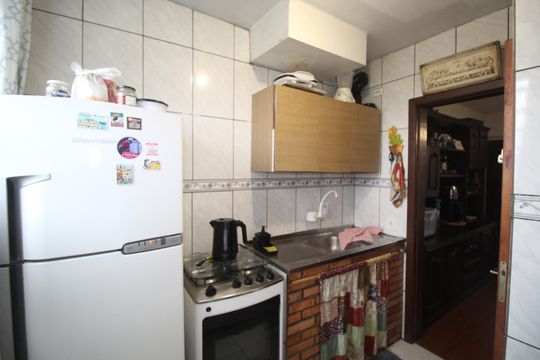 Cozinha de apartamento à venda com 2 quartos, 54m² em Rubem Berta, Porto Alegre