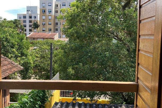 Varanda de casa à venda com 3 quartos, 130m² em Cavalhada, Porto Alegre