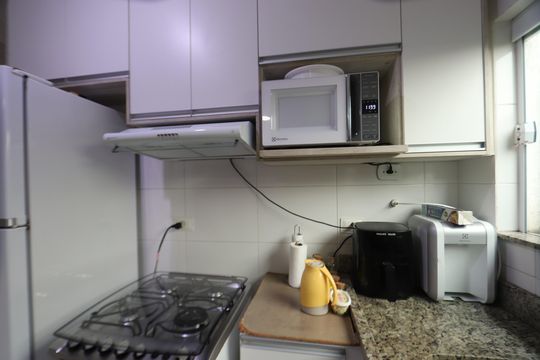 Cozinha de casa de condomínio à venda com 2 quartos, 60m² em Jardim Tiete, São Paulo