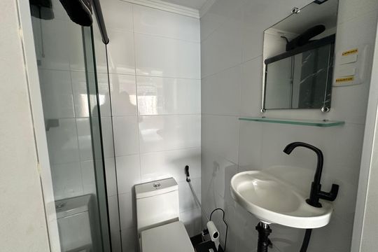 Banheiro suíte  de apartamento para alugar com 1 quarto, 50m² em Centro, São Vicente