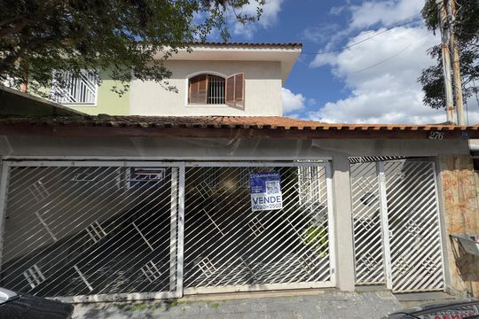 Placa instalada na fachada do imóvel de casa para alugar com 4 quartos, 171m² em Jardim Santa Mena, Guarulhos