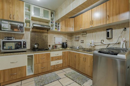 Cozinha e Área de Serviço de apartamento para alugar com 2 quartos, 110m² em Floresta, Porto Alegre