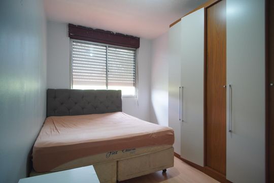 Quarto 1 de apartamento para alugar com 2 quartos, 55m² em Santa Rosa de Lima, Porto Alegre