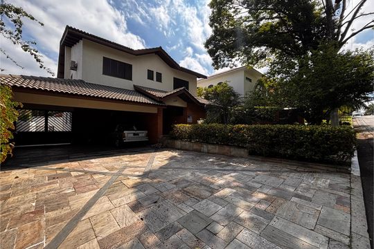 Fachada com placa de casa de condomínio para alugar com 5 quartos, 600m² em Jardim Paulista, Barueri