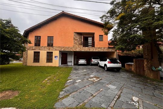 Fachada com placa  de casa de condomínio à venda com 5 quartos, 540m² em Morada dos Pinheiros (aldeia da Serra), Barueri