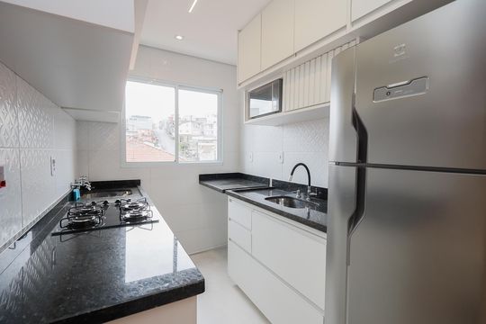 Cozinha e Área de Serviço de casa de condomínio para alugar com 2 quartos, 40m² em Parada Inglesa, São Paulo
