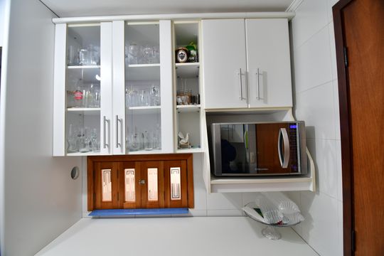 Cozinha de apartamento à venda com 2 quartos, 78m² em Cambuí, Campinas