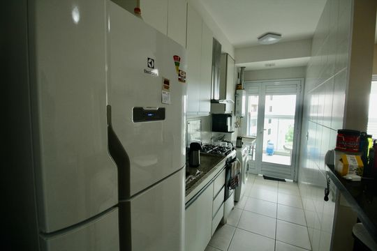 Cozinha e Área de Serviço de apartamento para alugar com 2 quartos, 76m² em José Menino, Santos