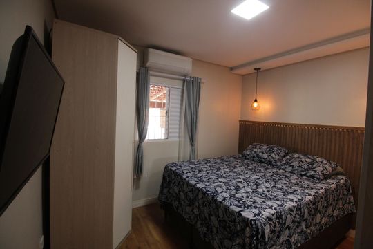 Suíte de casa de condomínio para alugar com 2 quartos, 145m² em Estuário, Santos