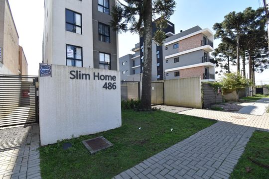 Fachada do condomínio de kitnet/studio para alugar com 1 quarto, 27m² em Novo Mundo, Curitiba