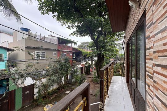 Fachada  de casa para alugar com 2 quartos, 68m² em Barra da Tijuca, Rio de Janeiro