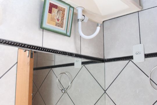 Banheiro de kitnet/studio para alugar com 1 quarto, 50m² em Setor Morais, Goiânia
